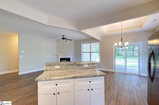918 Belton Hwy, Williamston, SC 29691 - kitchen with dark wood-type flooring, a raised ceiling, open floor plan, and a ceiling fan
