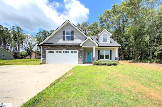 918 Belton Hwy, Williamston, SC 29691 - craftsman-style house featuring stone siding, a front yard, driveway, and a garage