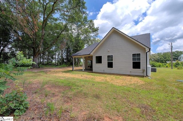 918 Belton Hwy, Williamston, SC 29691 - back of house featuring a lawn and roof with shingles