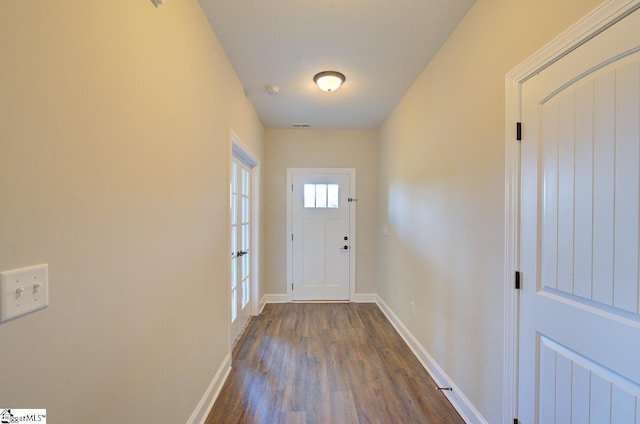 918 Belton Hwy, Williamston, SC 29691 - doorway to outside featuring dark wood-style flooring and baseboards