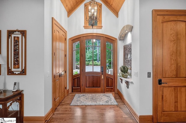 915 Rippling Water Way, Salem, SC 29676 - foyer featuring wood finished floors, a chandelier, wood ceiling, arched walkways, and high vaulted ceiling