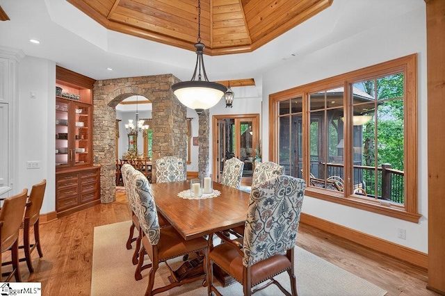 915 Rippling Water Way, Salem, SC 29676 - dining room with a tray ceiling, light wood-type flooring, wood ceiling, arched walkways, and recessed lighting