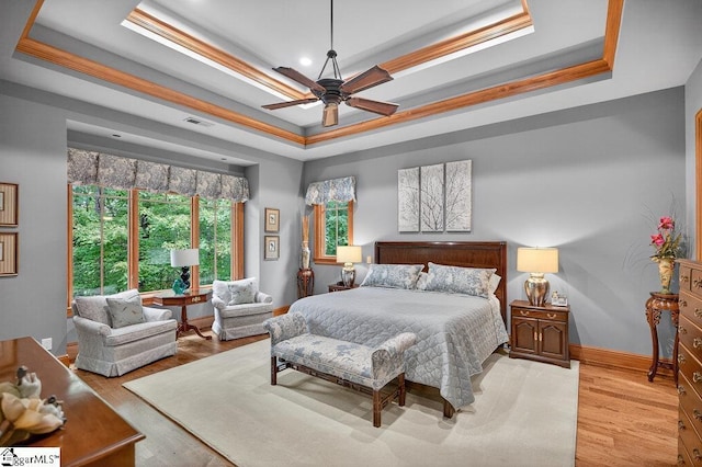 915 Rippling Water Way, Salem, SC 29676 - bedroom featuring a raised ceiling, light wood-style flooring, and ceiling fan
