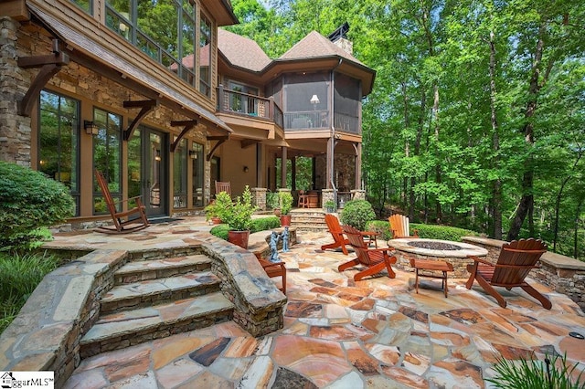 915 Rippling Water Way, Salem, SC 29676 - patio / terrace with an outdoor fire pit, a patio, and a sunroom
