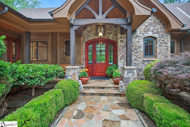 915 Rippling Water Way, Salem, SC 29676 - doorway to property featuring stone siding, a shingled roof, and covered porch