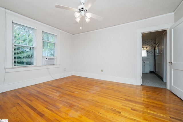 306 Mcdaniel Ave, Greenville, SC 29601 - spare room featuring light wood-style floors, cooling unit, ceiling fan, and crown molding