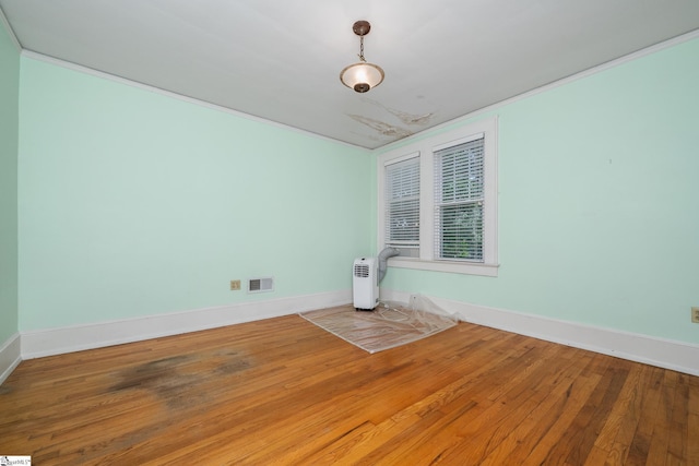 306 Mcdaniel Ave, Greenville, SC 29601 - unfurnished room with wood finished floors and baseboards