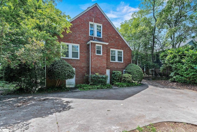 306 Mcdaniel Ave, Greenville, SC 29601 - view of home's exterior featuring brick siding
