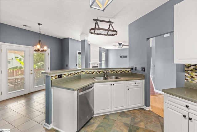 323 Waterton Way, Simpsonville, SC 29680 - kitchen featuring stainless steel dishwasher, decorative columns, white cabinets, ceiling fan, and a peninsula