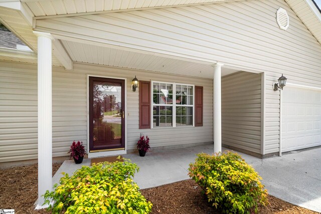 210 Admiral Ln, Greer, SC 29650 - entrance to property featuring a porch and an attached garage