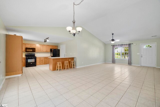 210 Admiral Ln, Greer, SC 29650 - unfurnished living room featuring lofted ceiling, ceiling fan, a chandelier, light tile patterned flooring, and rail lighting