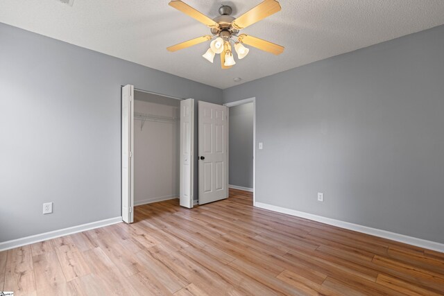 29 Parkgate Ct, Simpsonville, SC 29680 - unfurnished bedroom with light wood-type flooring, a closet, and a ceiling fan
