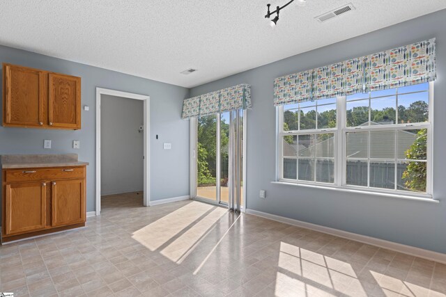 29 Parkgate Ct, Simpsonville, SC 29680 - unfurnished dining area with a textured ceiling