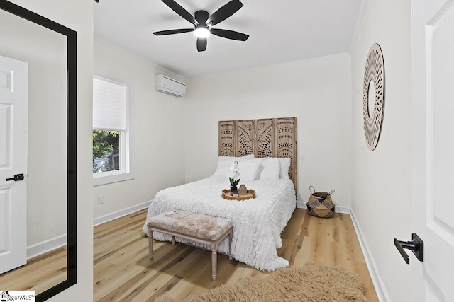 119 Trussell St, Honea Path, SC 29654 - bedroom with an AC wall unit, ornamental molding, wood finished floors, and a ceiling fan