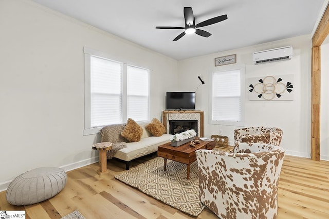 119 Trussell St, Honea Path, SC 29654 - living room with a wall unit AC, wood finished floors, a ceiling fan, healthy amount of natural light, and crown molding
