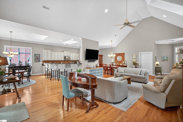 109 Tall Ship Dr, Anderson, SC 29625 - living area with a chandelier, high vaulted ceiling, a skylight, recessed lighting, and light wood-type flooring