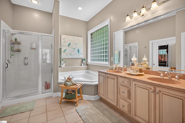 109 Tall Ship Dr, Anderson, SC 29625 - full bath with a stall shower, a garden tub, double vanity, and tile patterned flooring