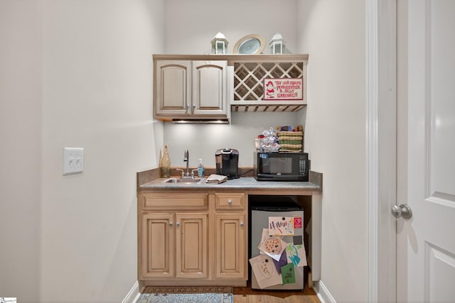 109 Tall Ship Dr, Anderson, SC 29625 - indoor wet bar featuring black microwave and light wood-style flooring