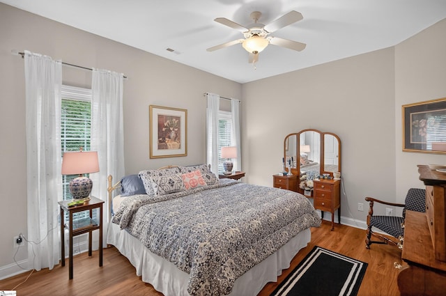 109 Tall Ship Dr, Anderson, SC 29625 - bedroom featuring multiple windows, light wood-type flooring, and ceiling fan