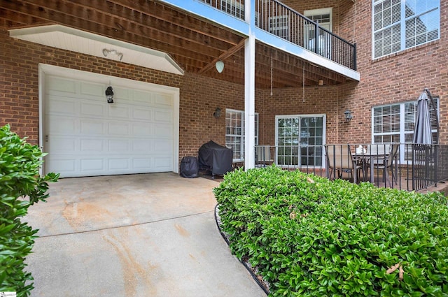 109 Tall Ship Dr, Anderson, SC 29625 - doorway to property with concrete driveway, brick siding, and a garage