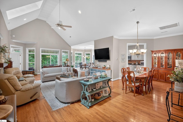 109 Tall Ship Dr, Anderson, SC 29625 - living room featuring high vaulted ceiling, light wood-type flooring, a chandelier, ceiling fan, and a skylight