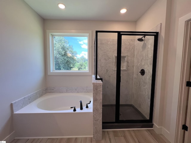 3352 Earls Bridge Rd, Easley, SC 29640 - bathroom featuring a bath, wood finished floors, a shower stall, and recessed lighting