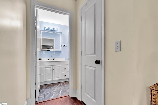 226 Mariposa Cir, Anderson, SC 29621 - hallway featuring dark wood-style floors and a sink