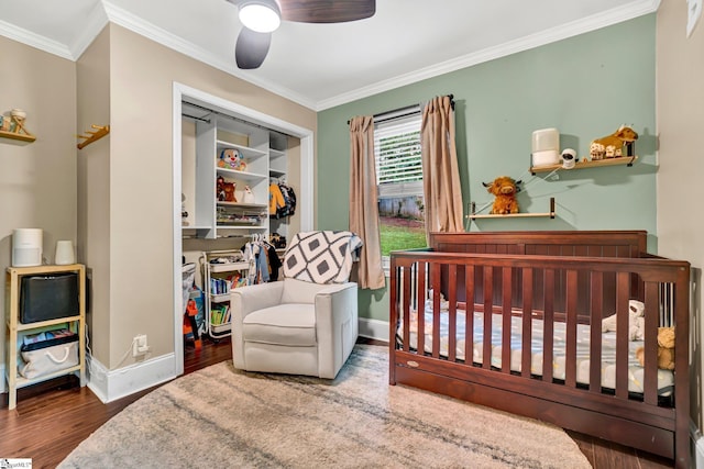 226 Mariposa Cir, Anderson, SC 29621 - bedroom with a closet, wood finished floors, ornamental molding, a nursery area, and ceiling fan