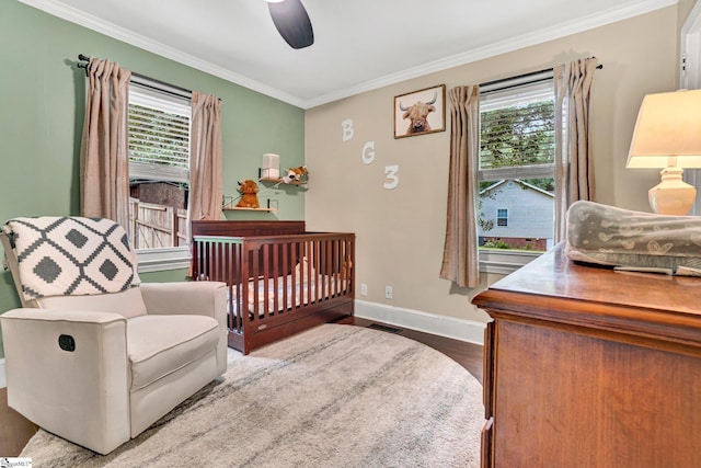 226 Mariposa Cir, Anderson, SC 29621 - bedroom with crown molding, multiple windows, wood finished floors, and ceiling fan