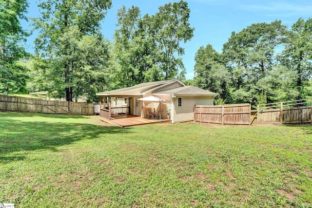 226 Mariposa Cir, Anderson, SC 29621 - rear view of house with a fenced backyard, a wooden deck, and view of scattered trees