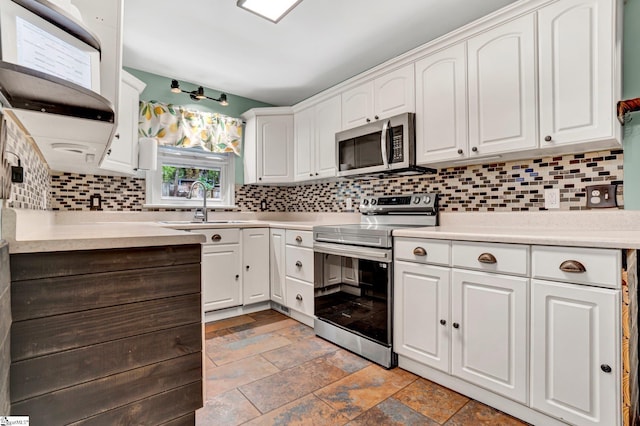 226 Mariposa Cir, Anderson, SC 29621 - kitchen featuring appliances with stainless steel finishes, backsplash, white cabinetry, and light countertops