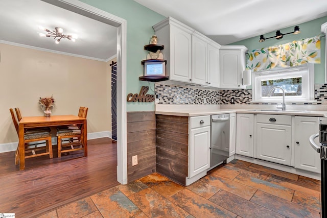 226 Mariposa Cir, Anderson, SC 29621 - kitchen with stainless steel dishwasher, backsplash, white cabinetry, light countertops, and ornamental molding