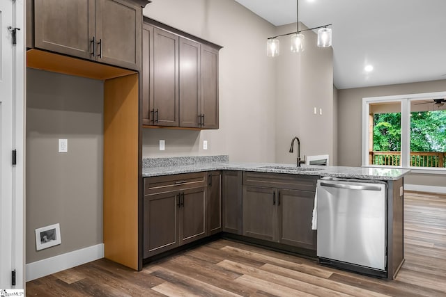 156 Grand Oak Cir, Pendleton, SC 29670 - kitchen with dishwasher, a peninsula, wood finished floors, and light stone countertops