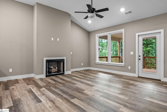 156 Grand Oak Cir, Pendleton, SC 29670 - unfurnished living room with vaulted ceiling, wood finished floors, a fireplace, and ceiling fan