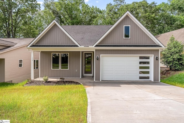 156 Grand Oak Cir, Pendleton, SC 29670 - view of front of home featuring driveway, roof with shingles, a garage, a porch, and a front yard