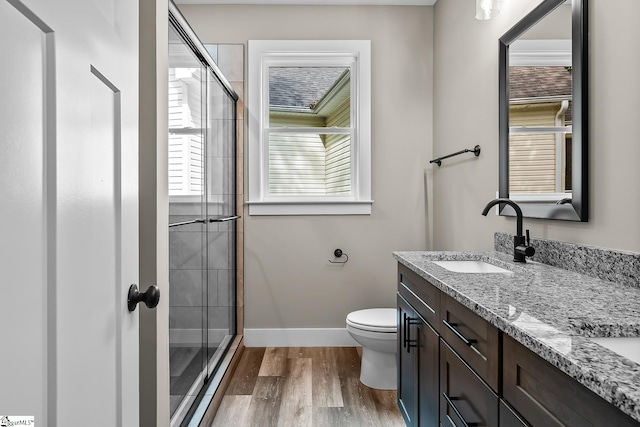 156 Grand Oak Cir, Pendleton, SC 29670 - bathroom featuring vanity, a shower stall, and wood finished floors
