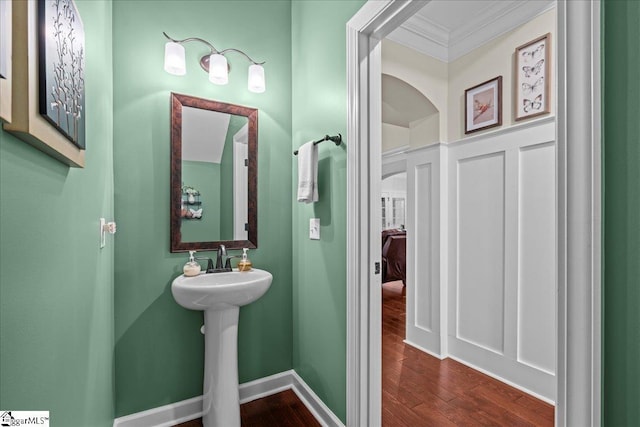 228 Holstein Ct, Fountain Inn, SC 29644 - bathroom with crown molding and wood finished floors