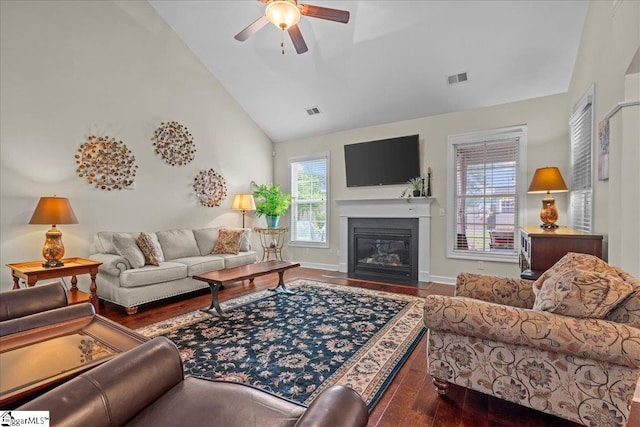 228 Holstein Ct, Fountain Inn, SC 29644 - living area featuring a ceiling fan, high vaulted ceiling, dark wood-style floors, healthy amount of natural light, and a fireplace with flush hearth