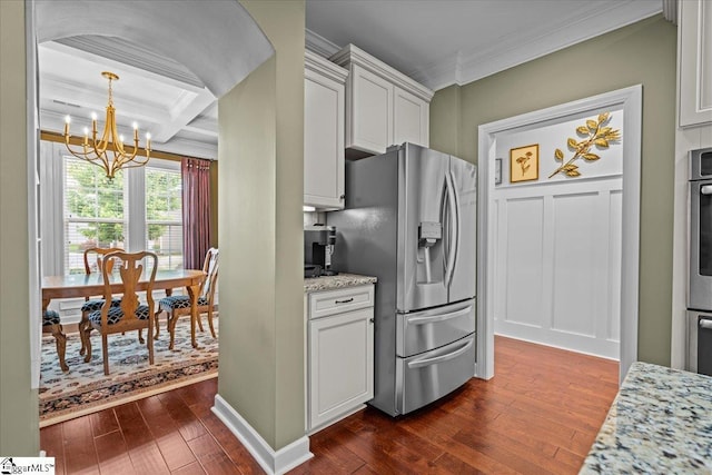 228 Holstein Ct, Fountain Inn, SC 29644 - kitchen featuring stainless steel fridge with ice dispenser, crown molding, dark wood-style floors, a chandelier, and coffered ceiling