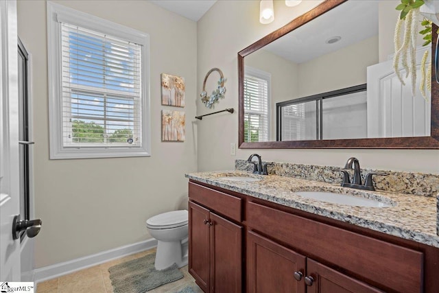 228 Holstein Ct, Fountain Inn, SC 29644 - bathroom with an enclosed shower, double vanity, and tile patterned flooring