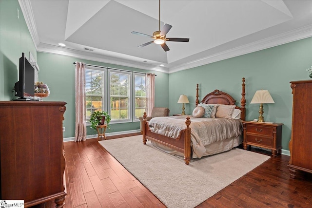 228 Holstein Ct, Fountain Inn, SC 29644 - bedroom with a tray ceiling, hardwood / wood-style flooring, crown molding, recessed lighting, and a ceiling fan