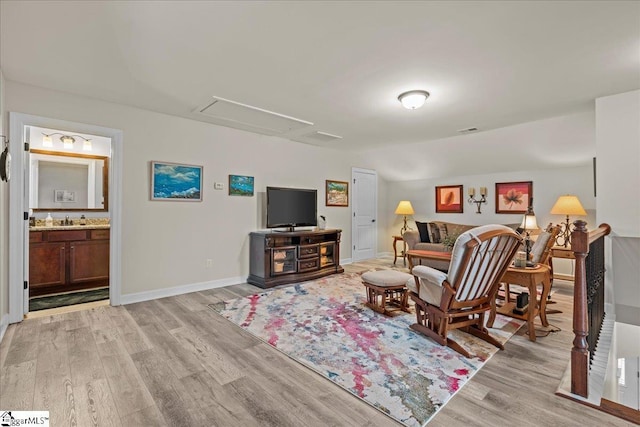 228 Holstein Ct, Fountain Inn, SC 29644 - living area with light wood finished floors and attic access