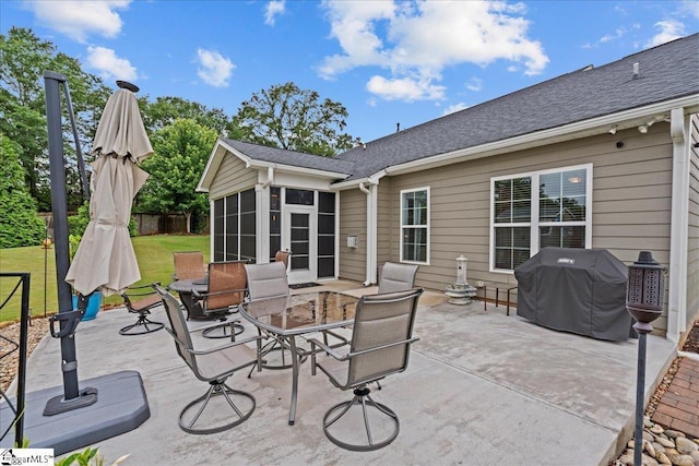 228 Holstein Ct, Fountain Inn, SC 29644 - view of patio featuring a sunroom, grilling area, and outdoor dining space