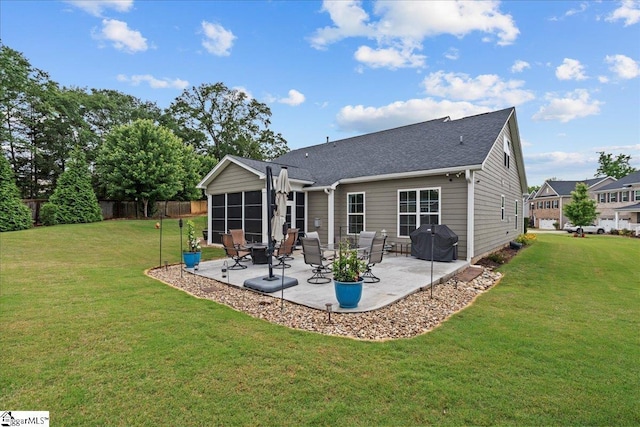 228 Holstein Ct, Fountain Inn, SC 29644 - back of house featuring a patio area, roof with shingles, and a sunroom