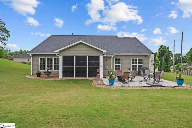 228 Holstein Ct, Fountain Inn, SC 29644 - back of property featuring a patio area, a lawn, a sunroom, and roof with shingles