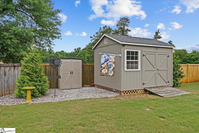 228 Holstein Ct, Fountain Inn, SC 29644 - view of shed featuring a fenced backyard