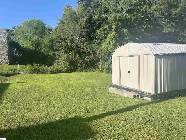 101 Elm St, Clinton, SC 29325 - view of grassy yard with a storage unit