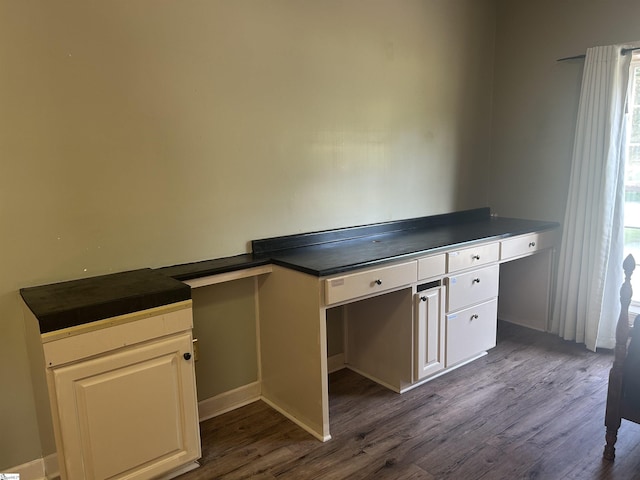 101 Elm St, Clinton, SC 29325 - unfurnished office with dark wood-type flooring and built in desk
