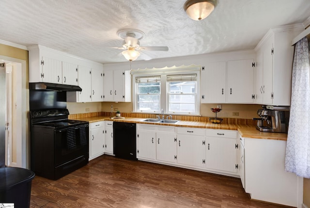 506 Piedmont Hwy, Piedmont, SC 29673 - kitchen featuring black appliances, under cabinet range hood, ceiling fan, dark wood-style floors, and crown molding