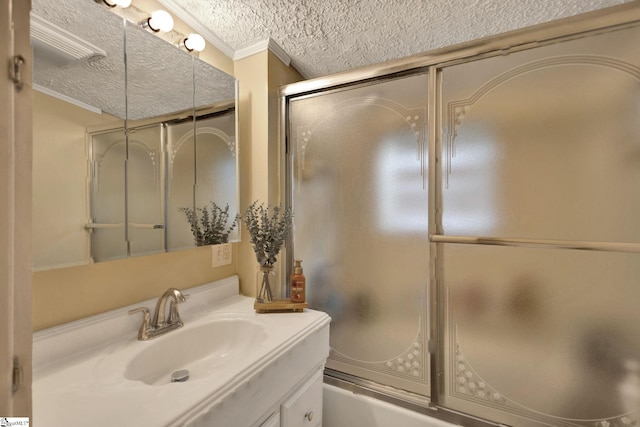 506 Piedmont Hwy, Piedmont, SC 29673 - bathroom with vanity, ornamental molding, a textured ceiling, and bath / shower combo with glass door